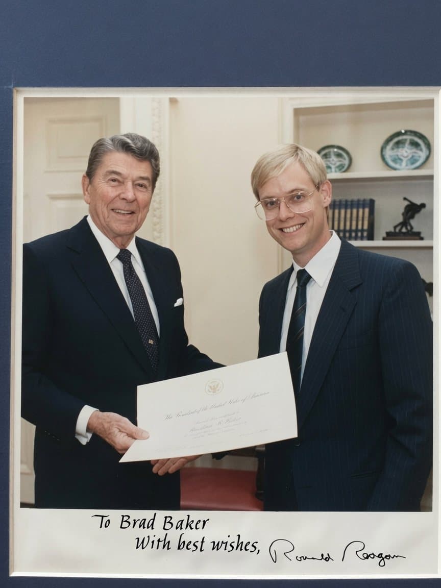 Brad Baker receiving his White House Fellow certificate from President Ronald Reagan in 1988